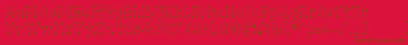 GagooByKreativfont.Com Font – Brown Fonts on Red Background