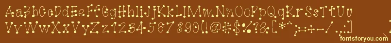 GagooByKreativfont.Com Font – Yellow Fonts on Brown Background