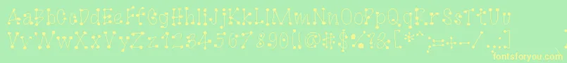 GagooByKreativfont.Com Font – Yellow Fonts on Green Background