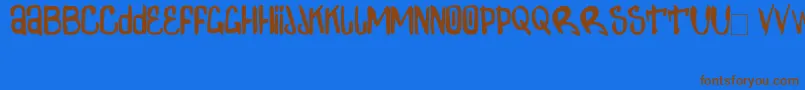 フォントZdarxSimpl2 – 茶色の文字が青い背景にあります。