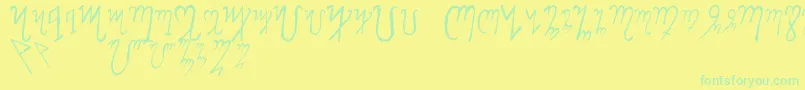 ThebanAlphabet-Schriftart – Grüne Schriften auf gelbem Hintergrund