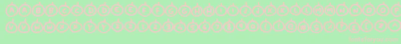 Baubles-fontti – vaaleanpunaiset fontit vihreällä taustalla