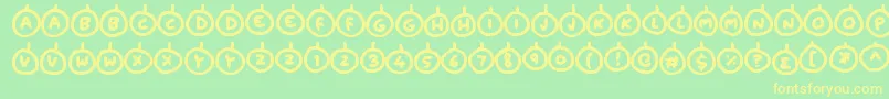 Baubles Font – Yellow Fonts on Green Background