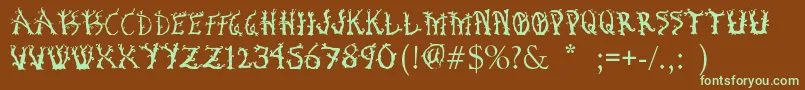 フォントBosqueEncantado – 緑色の文字が茶色の背景にあります。