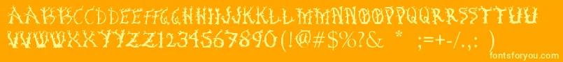 BosqueEncantado Font – Yellow Fonts on Orange Background