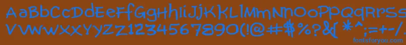 ComicGibi Font – Blue Fonts on Brown Background