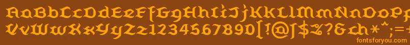 フォントBelugall – オレンジ色の文字が茶色の背景にあります。
