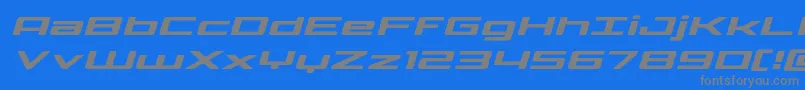 Phoenicialowercaseexpandital-Schriftart – Graue Schriften auf blauem Hintergrund
