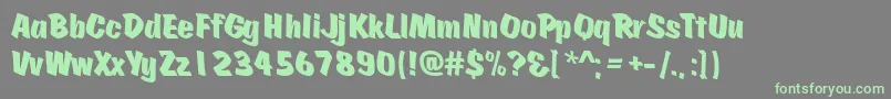 Scratch ffy-Schriftart – Grüne Schriften auf grauem Hintergrund