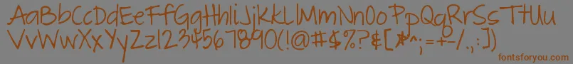 Thegreatescape Font – Brown Fonts on Gray Background