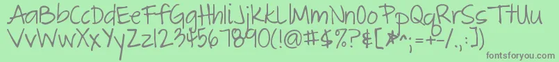 フォントThegreatescape – 緑の背景に灰色の文字
