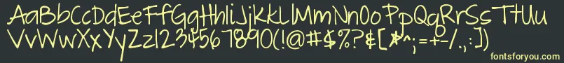 Thegreatescape Font – Yellow Fonts on Black Background