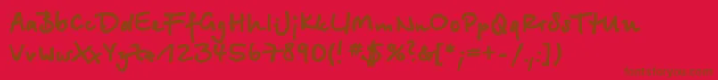 Betinascriptextractt Font – Brown Fonts on Red Background