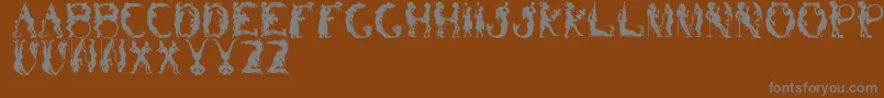 フォントBizarroRegular – 茶色の背景に灰色の文字