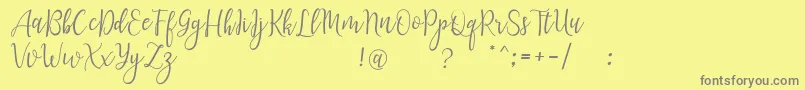 LanaraScriptDemo Font – Gray Fonts on Yellow Background