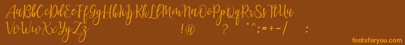 LanaraScriptDemo Font – Orange Fonts on Brown Background