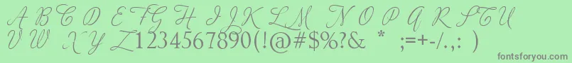 fuente AdiosScriptCapsIi – Fuentes Grises Sobre Fondo Verde