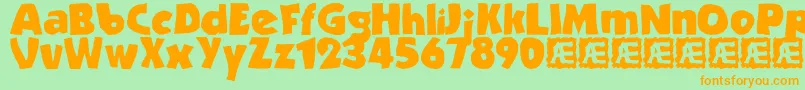 Strande2-fontti – oranssit fontit vihreällä taustalla