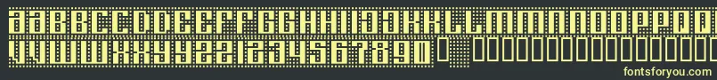 フォントComputeramok – 黒い背景に黄色の文字
