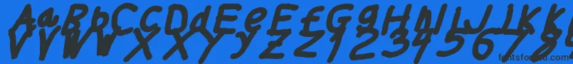 フォントThickerthanita – 黒い文字の青い背景