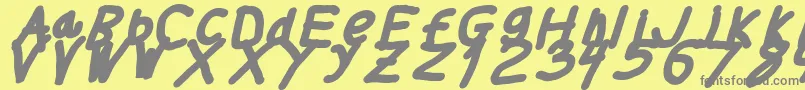 Thickerthanita-fontti – harmaat kirjasimet keltaisella taustalla