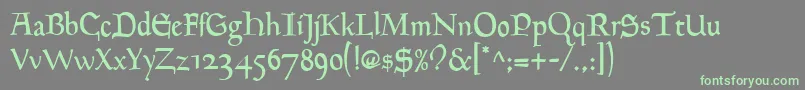 Goudymediaeval Regularフォントについての詳細 フォントGoudymediaeval Regular – 灰色の背景に緑のフォント