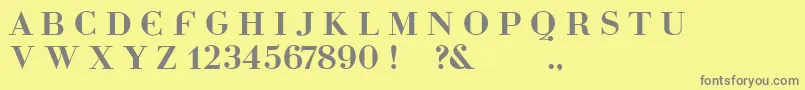 Dottybg-fontti – harmaat kirjasimet keltaisella taustalla