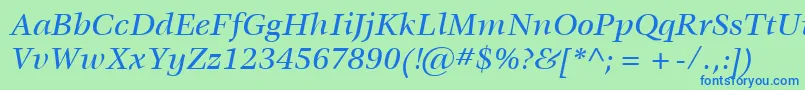 ItcVeljovicLtMediumItalic-Schriftart – Blaue Schriften auf grünem Hintergrund