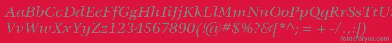 ItcVeljovicLtMediumItalic-fontti – harmaat kirjasimet punaisella taustalla