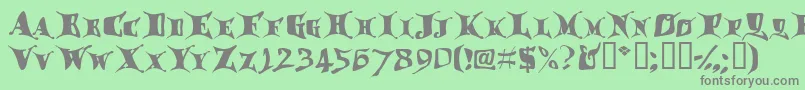 フォントDraggletail – 緑の背景に灰色の文字