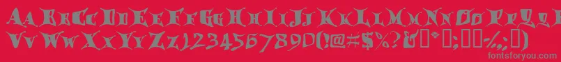 フォントDraggletail – 赤い背景に灰色の文字