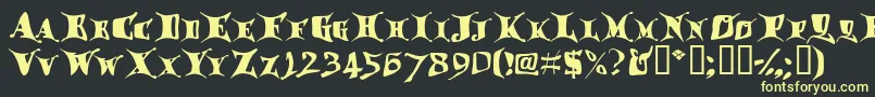 フォントDraggletail – 黒い背景に黄色の文字