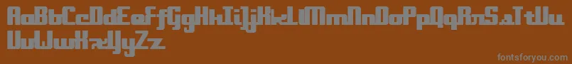Onakite Font – Gray Fonts on Brown Background
