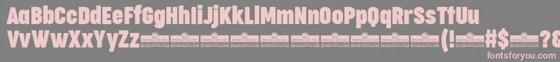Шрифт CocogooseCompressedBoldTrial – розовые шрифты на сером фоне