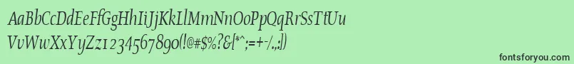 フォントOldstylecondensedItalic – 緑の背景に黒い文字