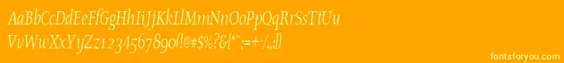 OldstylecondensedItalic-fontti – keltaiset fontit oranssilla taustalla