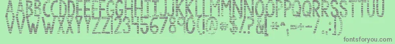 Czcionka Kgbythegraceofgod – szare czcionki na zielonym tle