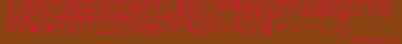 Шрифт Kgbythegraceofgod – красные шрифты на коричневом фоне