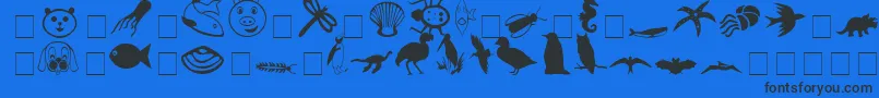 CarrAnimalDingbats-Schriftart – Schwarze Schriften auf blauem Hintergrund