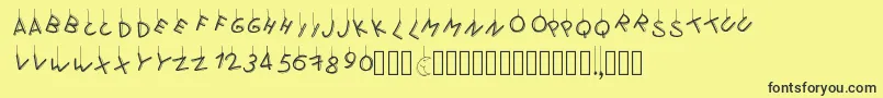 Pwflymetothemoon-Schriftart – Schwarze Schriften auf gelbem Hintergrund