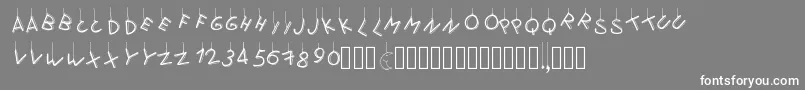 Pwflymetothemoon-fontti – valkoiset fontit harmaalla taustalla