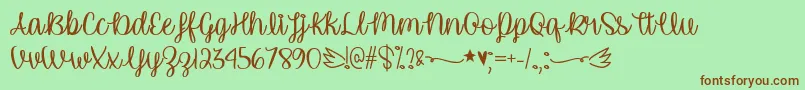 UnicornCalligraphyTtf Font – Brown Fonts on Green Background