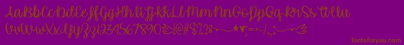 Czcionka UnicornCalligraphyTtf – brązowe czcionki na fioletowym tle