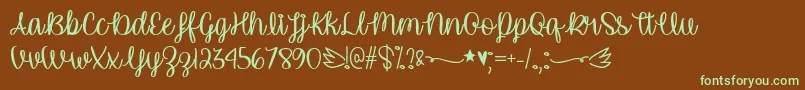 UnicornCalligraphyTtf-fontti – vihreät fontit ruskealla taustalla