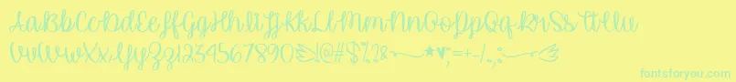 UnicornCalligraphyTtf-Schriftart – Grüne Schriften auf gelbem Hintergrund