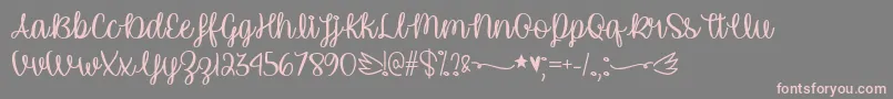 フォントUnicornCalligraphyTtf – 灰色の背景にピンクのフォント