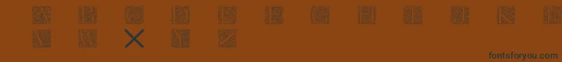 Fonte Torynitialen – fontes pretas em um fundo marrom