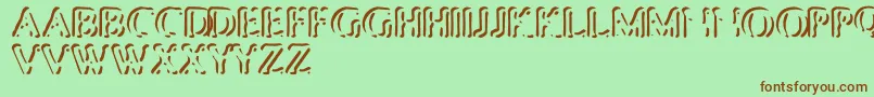 PunchedStub Font – Brown Fonts on Green Background