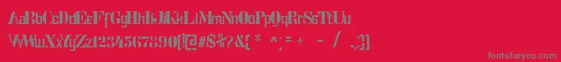 フォントStencilIntellectaTrashFree – 赤い背景に灰色の文字