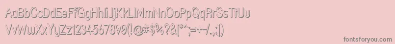 Strshdn-fontti – harmaat kirjasimet vaaleanpunaisella taustalla